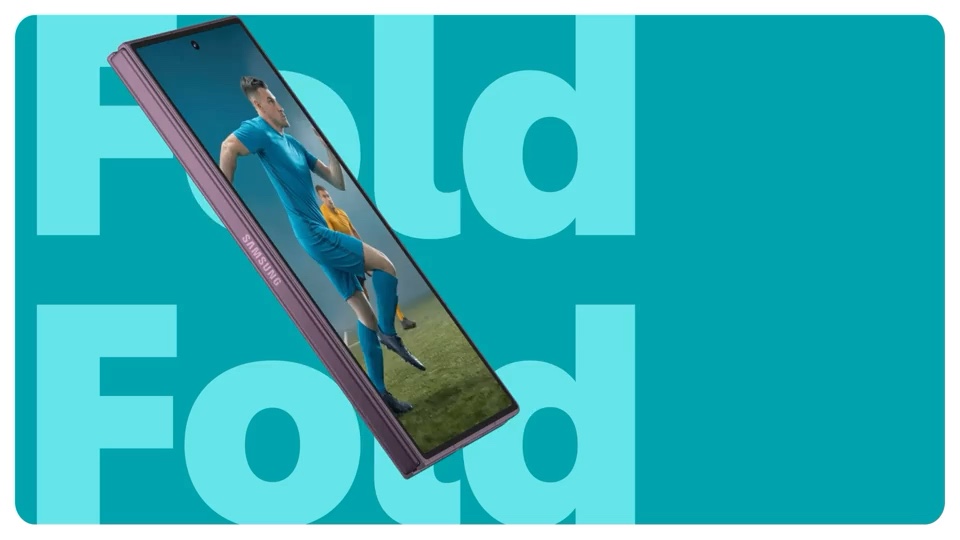 A footballer emerging from a Samsung foldable screen